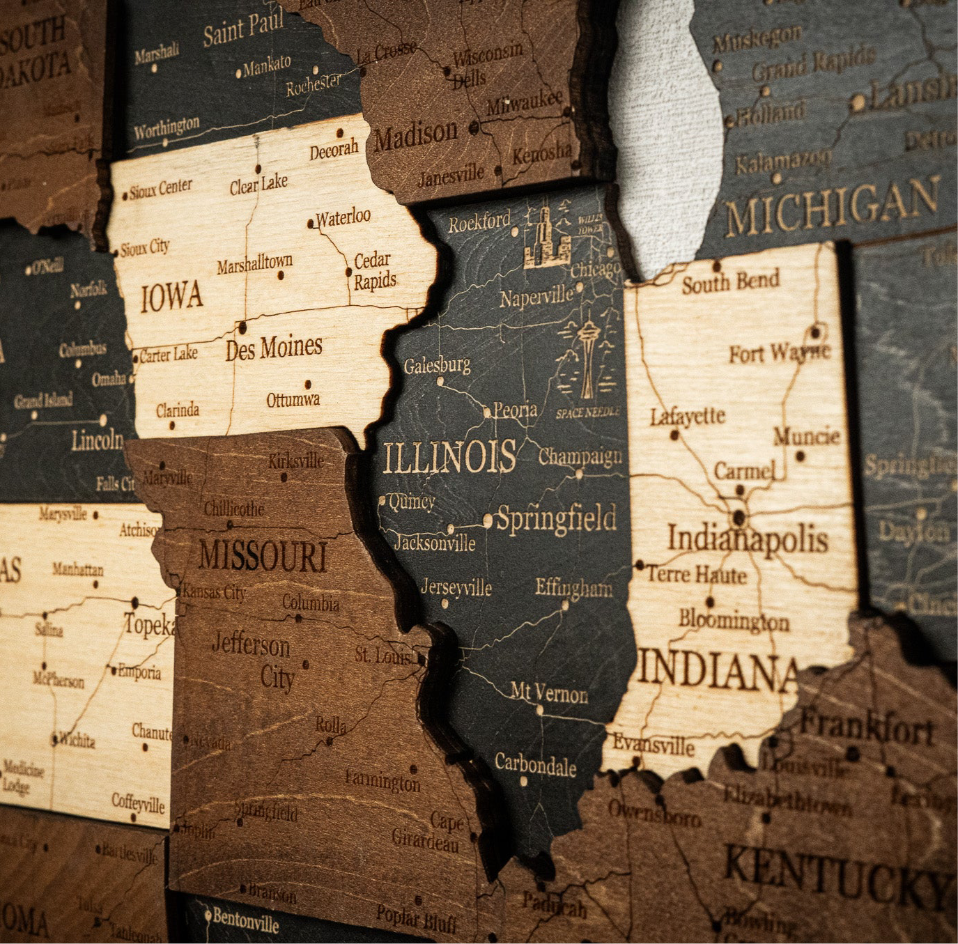 Wooden cutout map of the United States with states labeled