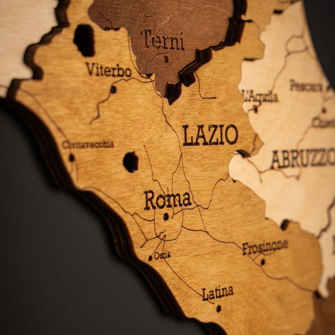 lazio and rome as part of a 3d wooden map of italy